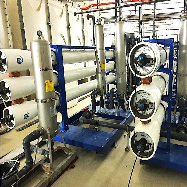 Reverse osmosis desalination units on a blue steel frame