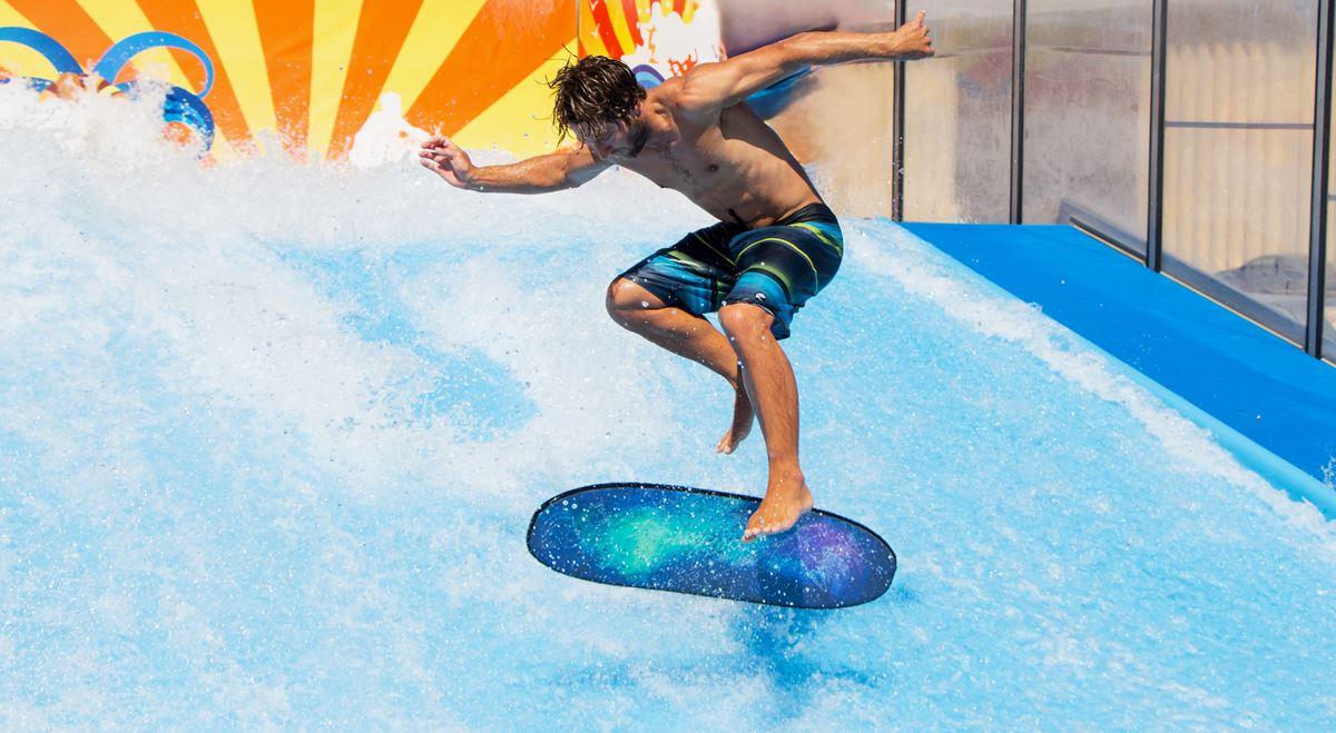 Rider surfing a standing wave on a bodyboard